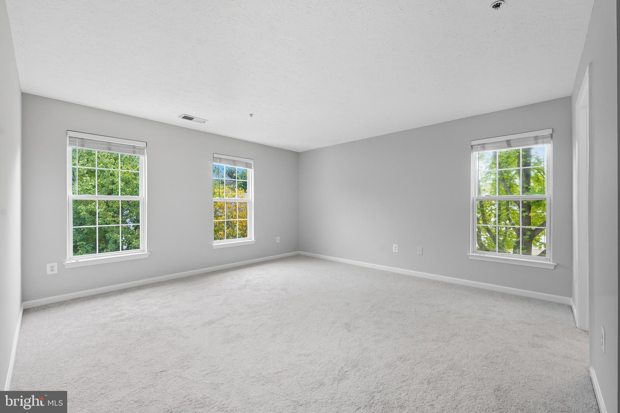 25910 Ridge Manor Drive, Unit 1000L Damascus, MD 20872 - Photo 28 of 51 Primary Bedroom Suite