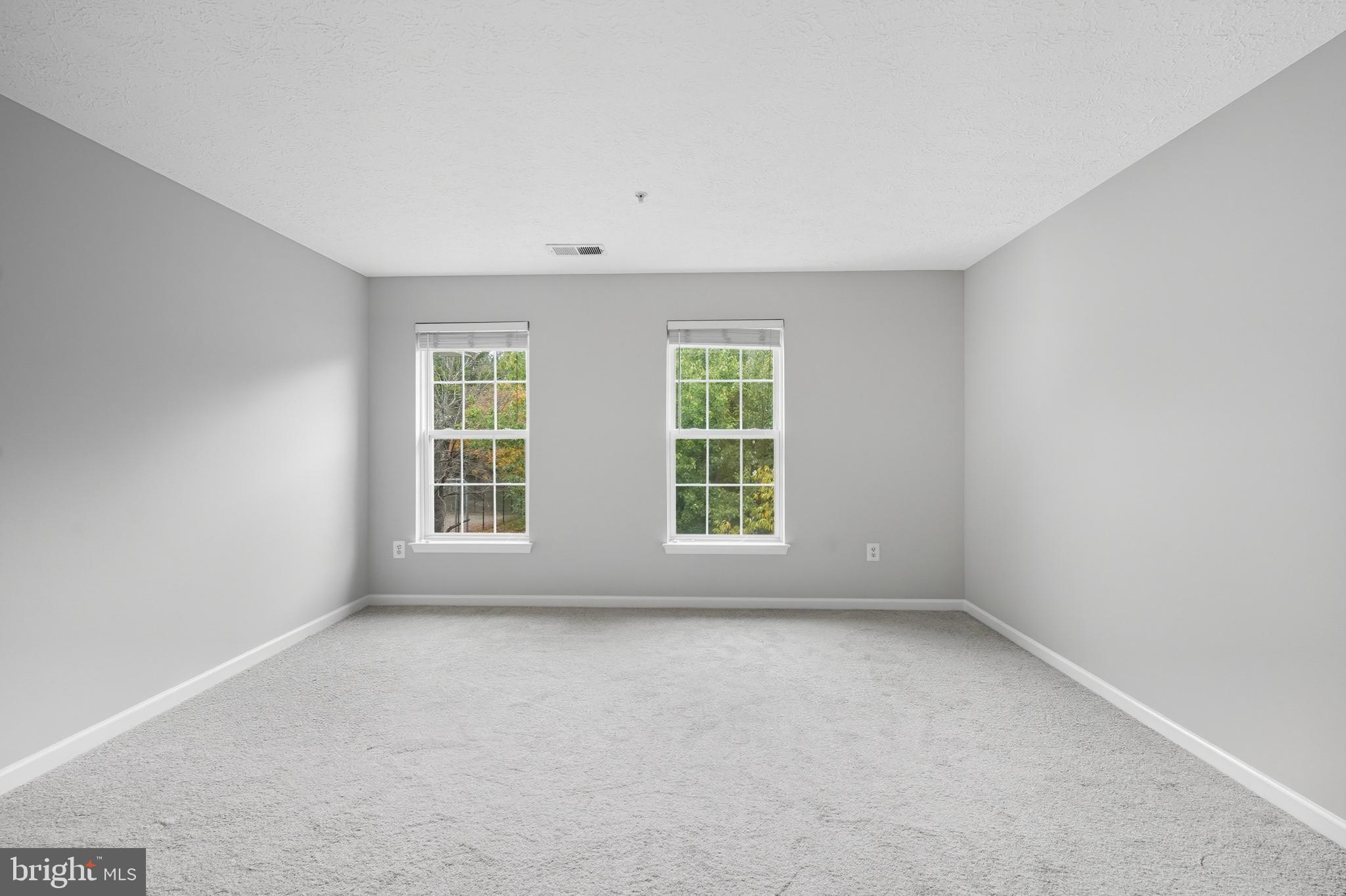 25910 Ridge Manor Drive, Unit 1000L Damascus, MD 20872 - Photo 30 of 51 Primary Bedroom Suite