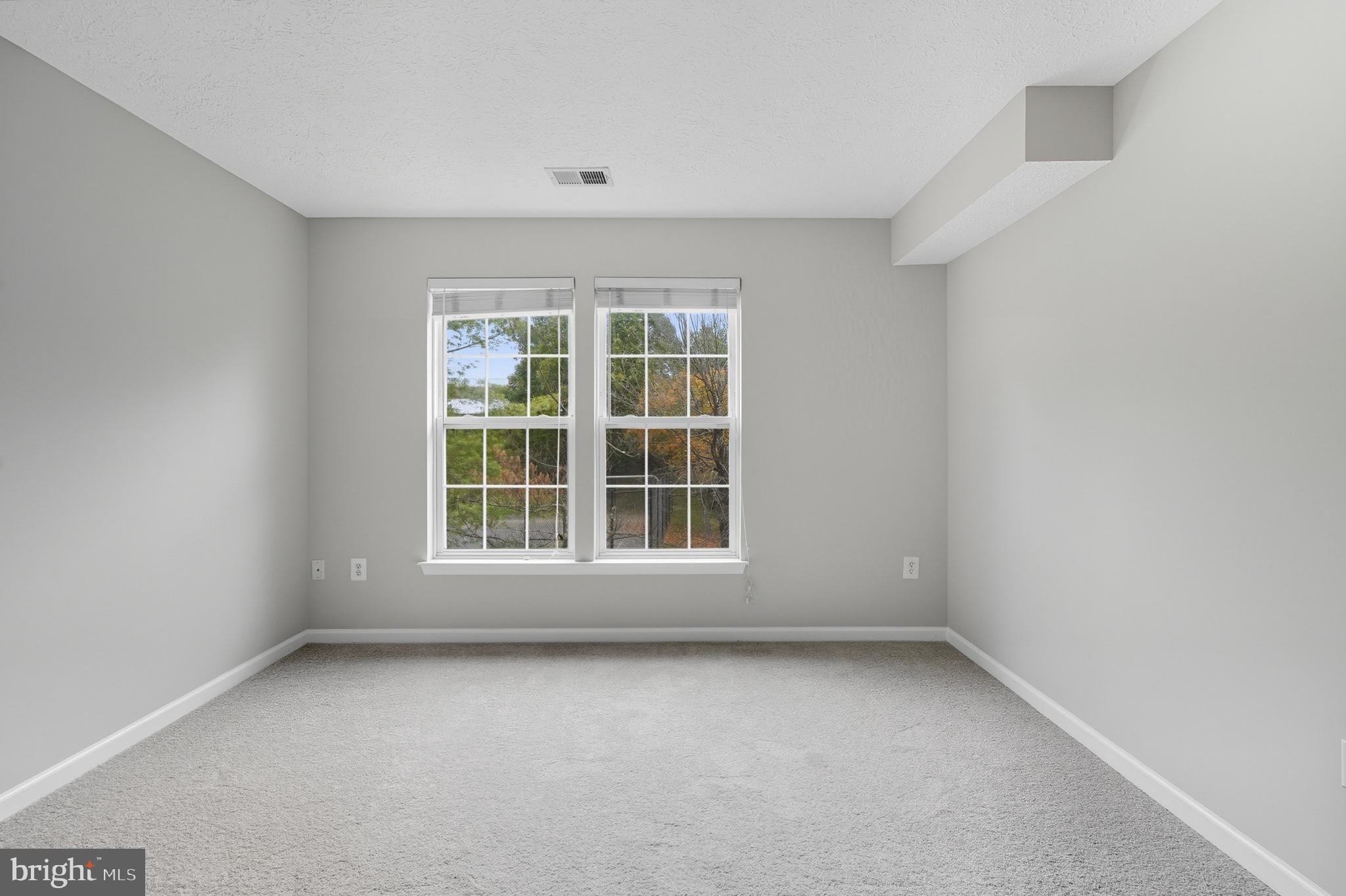 25910 Ridge Manor Drive, Unit 1000L Damascus, MD 20872 - Photo 37 of 51 Second Bedroom
