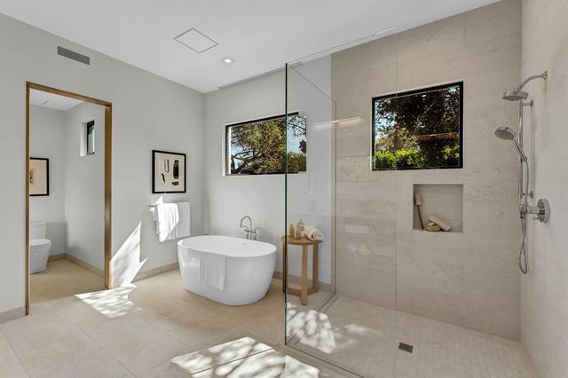 a view of swimming pool with outdoor seating