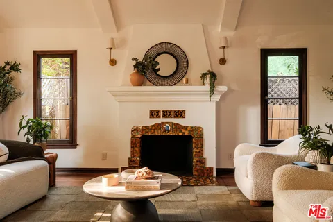 a living room with furniture and window