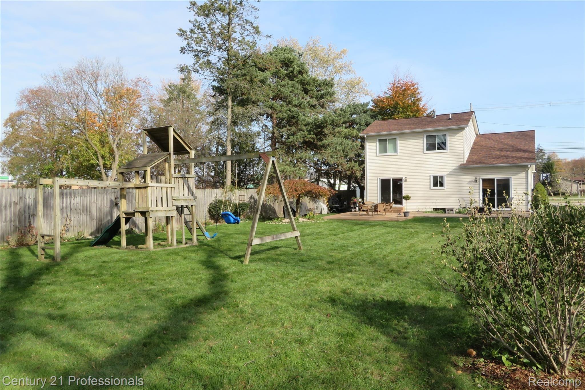 3070 Crooks Road Rochester, MI 48309 - Photo 15 of 17 Rear View of House and Backyard