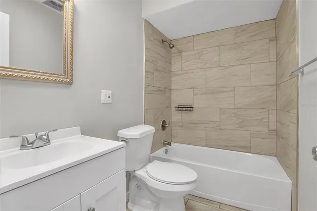 a bathroom with a sink and a toilet