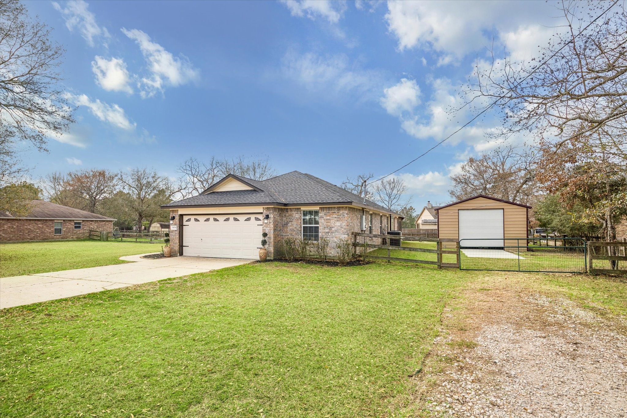 19034 Ranchcrest Drive Magnolia, TX 77355 - Photo 2 of 26 This property includes a large shed for extra storage or flex space. Situated in a peaceful neighborhood with plenty of green space.