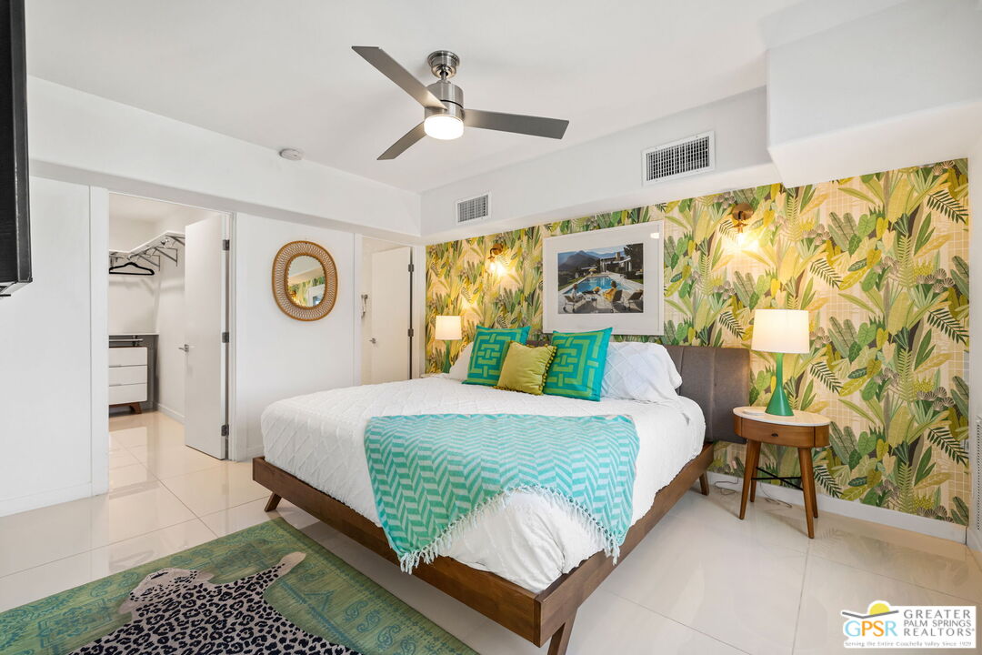 775 West Racquet Club Road Palm Springs, CA 92262 - Photo 34 of 38 a bedroom with a bed and window