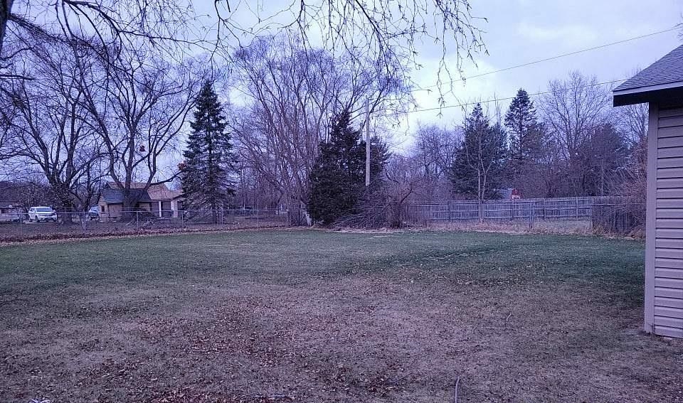 730 Ralston Road Machesney Park, IL 61115 - Photo 6 of 8 a view of yard covered with trees