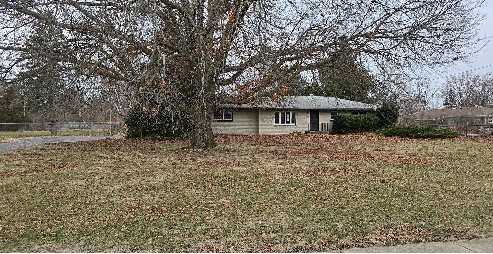 730 Ralston Road Machesney Park, IL 61115 - Photo 8 of 8 a front view of a house with a yard