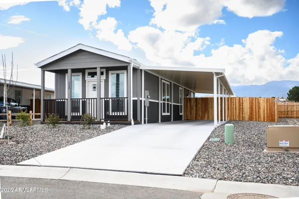 a front view of a house with garage