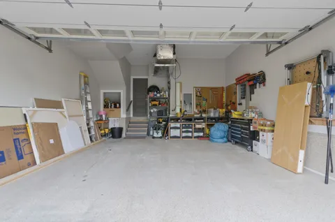 a view of a livingroom with furniture and a garage