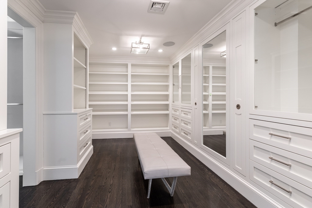 64 Albion Road Wellesley, MA 02481 - Photo 12 of 26 a view of walk in closet with empty racks