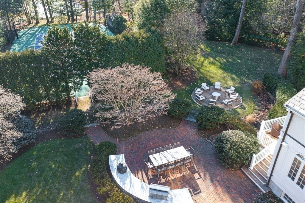 64 Albion Road Wellesley, MA 02481 - Photo 24 of 26 a view of a yard with seating area