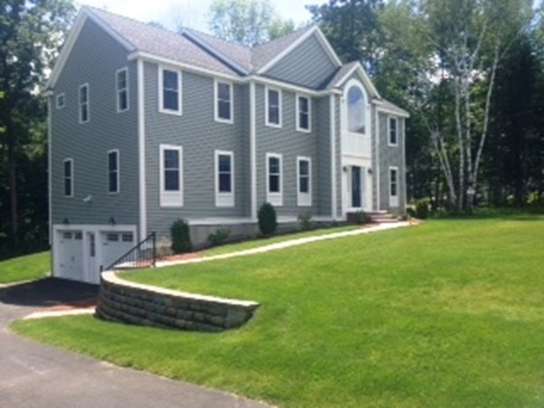 344 River Road Andover, MA 01810 - Photo 1 of 13 a front view of a house with a yard