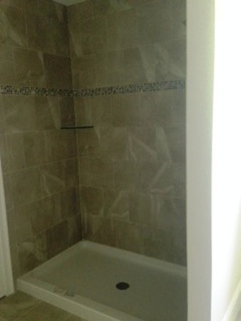 344 River Road Andover, MA 01810 - Photo 11 of 13 a bathroom with a bathtub
