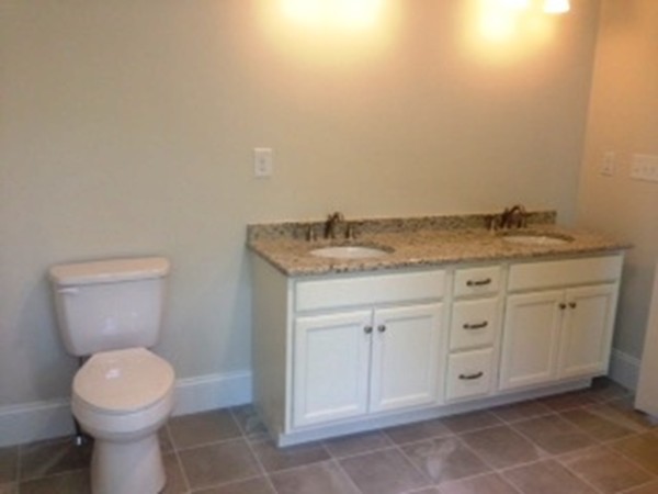 344 River Road Andover, MA 01810 - Photo 12 of 13 a bathroom with a granite countertop toilet and sink