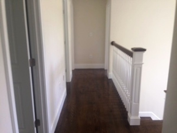 344 River Road Andover, MA 01810 - Photo 13 of 13 a view of a hallway with a wooden floor