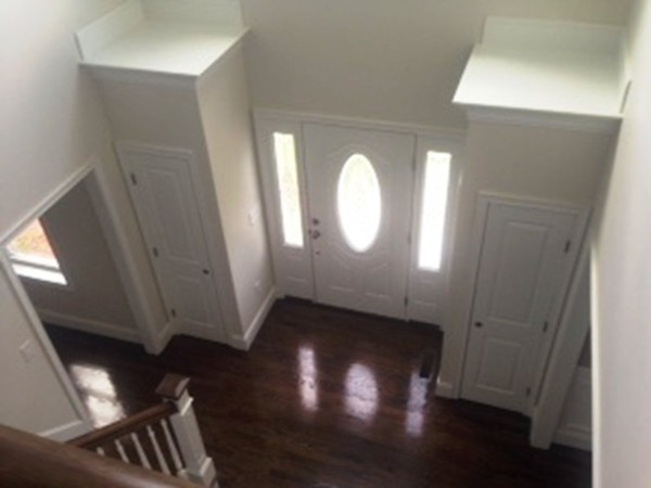 344 River Road Andover, MA 01810 - Photo 9 of 13 a view of a livingroom with wooden floor and a staircase