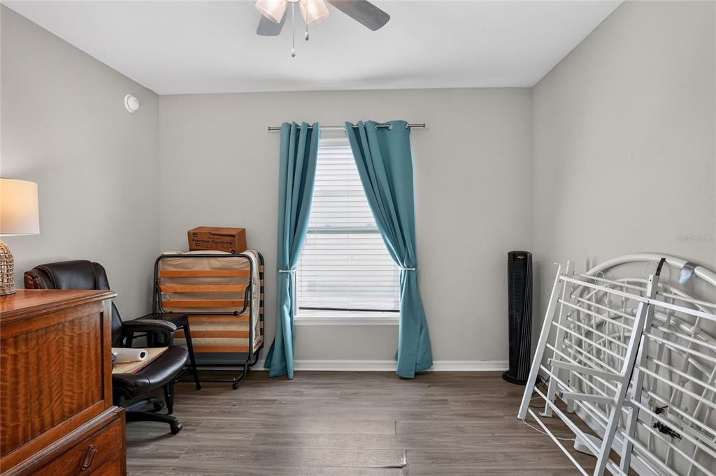 6360 Gardner Road Lakeland, FL 33813 - Photo 26 of 47 a room with furniture and a window