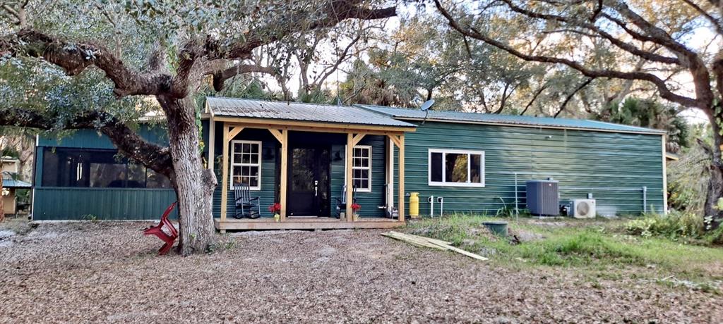 a house view with a outdoor space