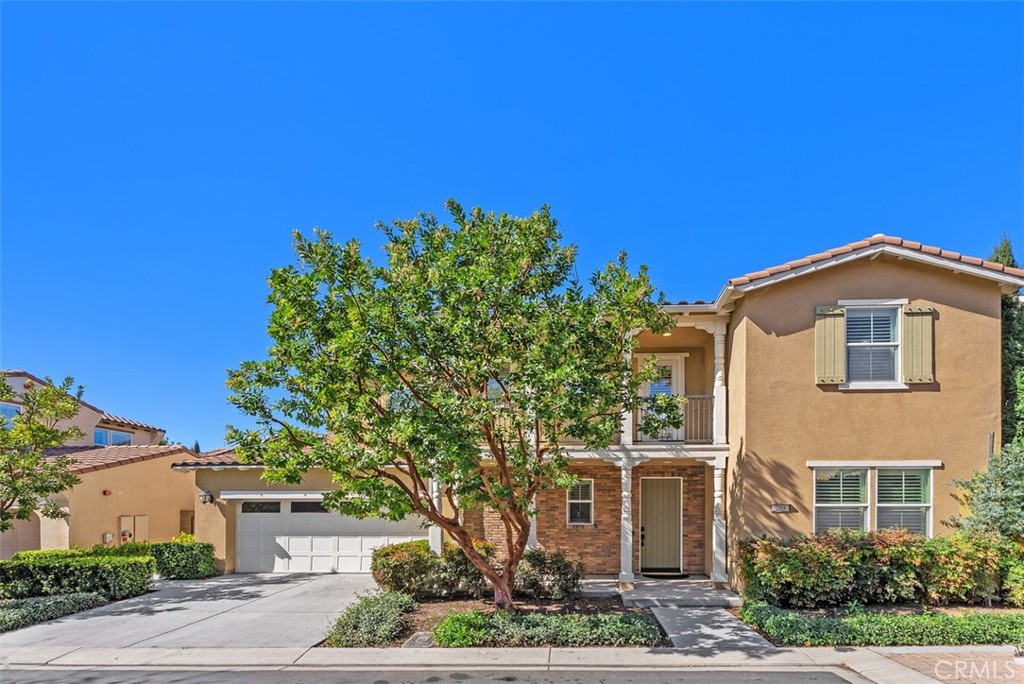 259 Wicker Irvine, CA 92618 - Photo 1 of 30 front view of a house with a tree