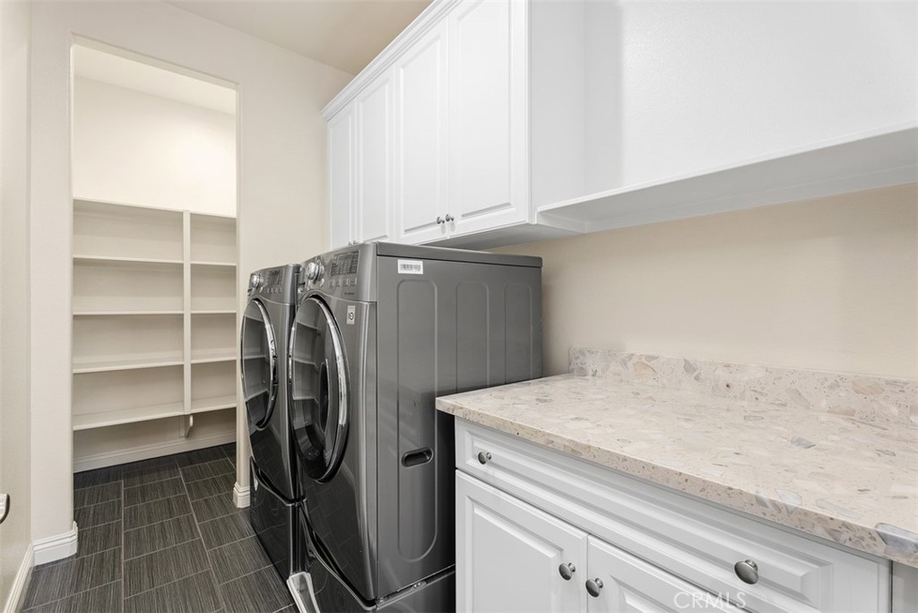 259 Wicker Irvine, CA 92618 - Photo 19 of 30 a utility room with cabinets