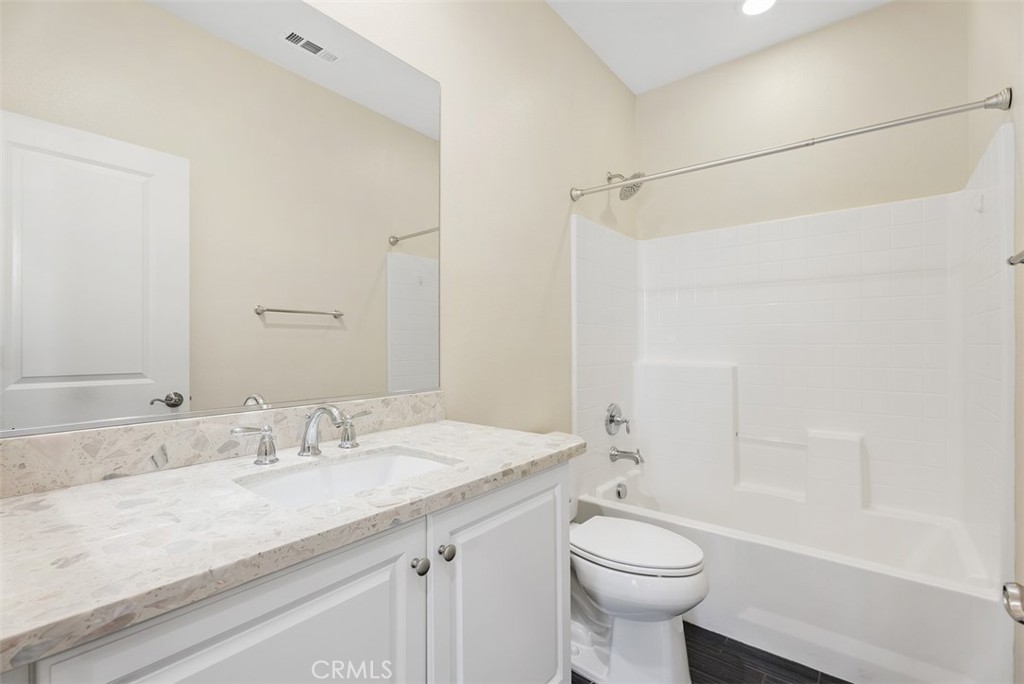 259 Wicker Irvine, CA 92618 - Photo 24 of 30 a bathroom with a sink a toilet and shower