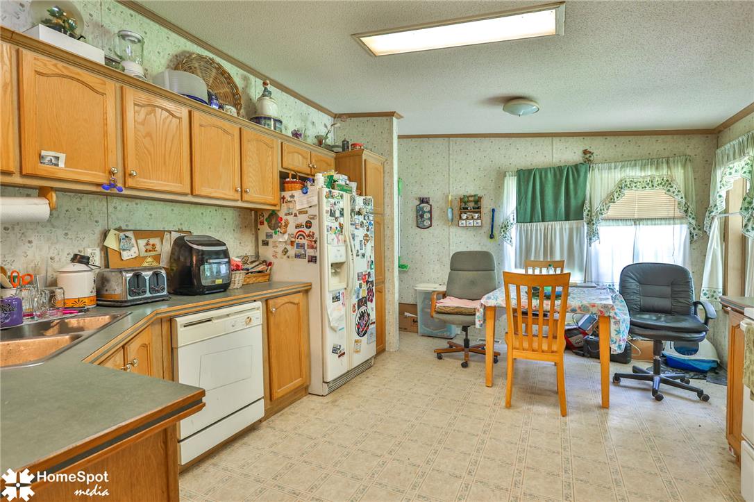 3795 Rhoades Road Kempton, PA 19529 - Photo 33 of 42 Functional kitchen with ample cabinetry and a casual dining area for everyday meals.