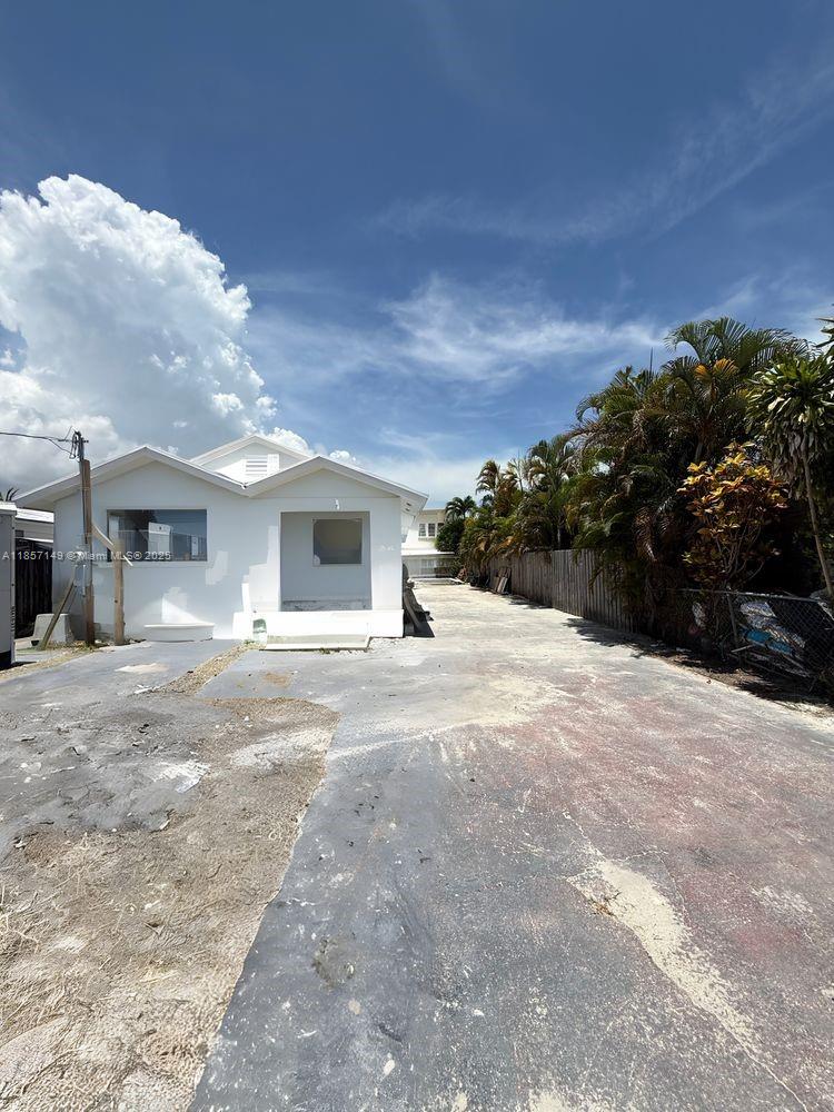 2235 Southwest 15th Street Miami, FL 33145 - Photo 2 of 17 a view of a house with a yard