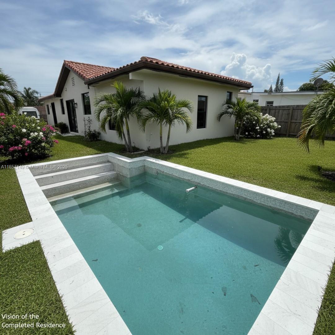 2235 Southwest 15th Street Miami, FL 33145 - Photo 3 of 17 a view of swimming pool with a yard