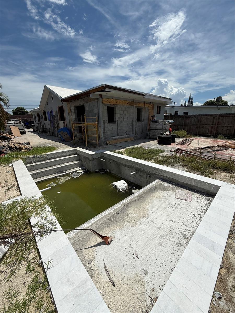 2235 Southwest 15th Street Miami, FL 33145 - Photo 4 of 17 a view of a house with swimming pool