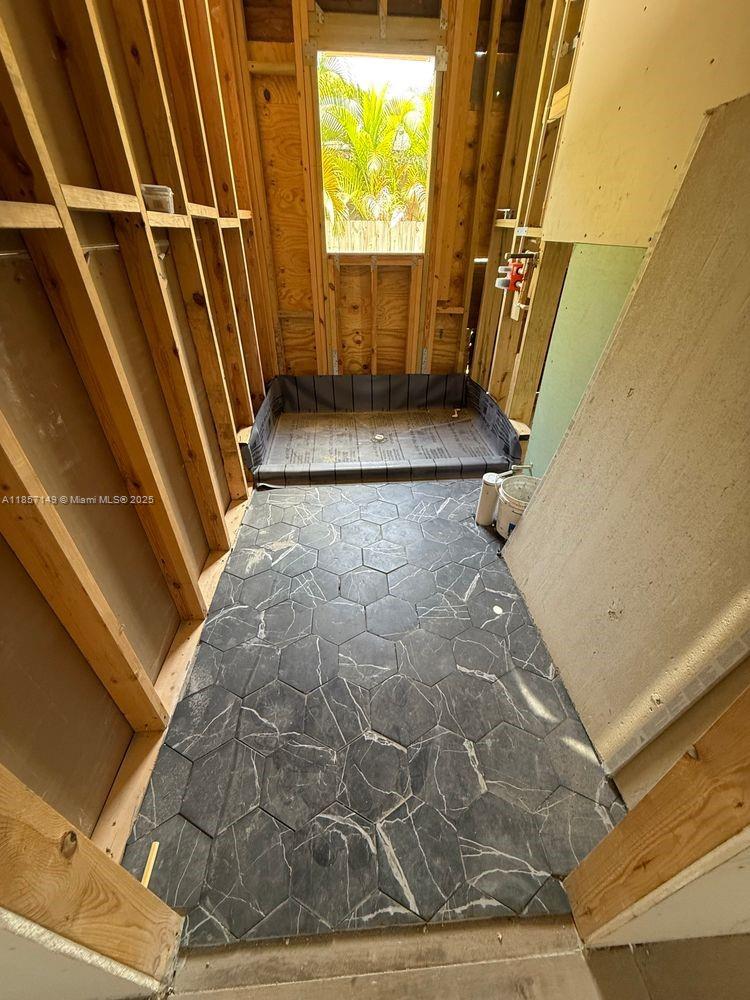 2235 Southwest 15th Street Miami, FL 33145 - Photo 8 of 17 a view of an empty room with a window