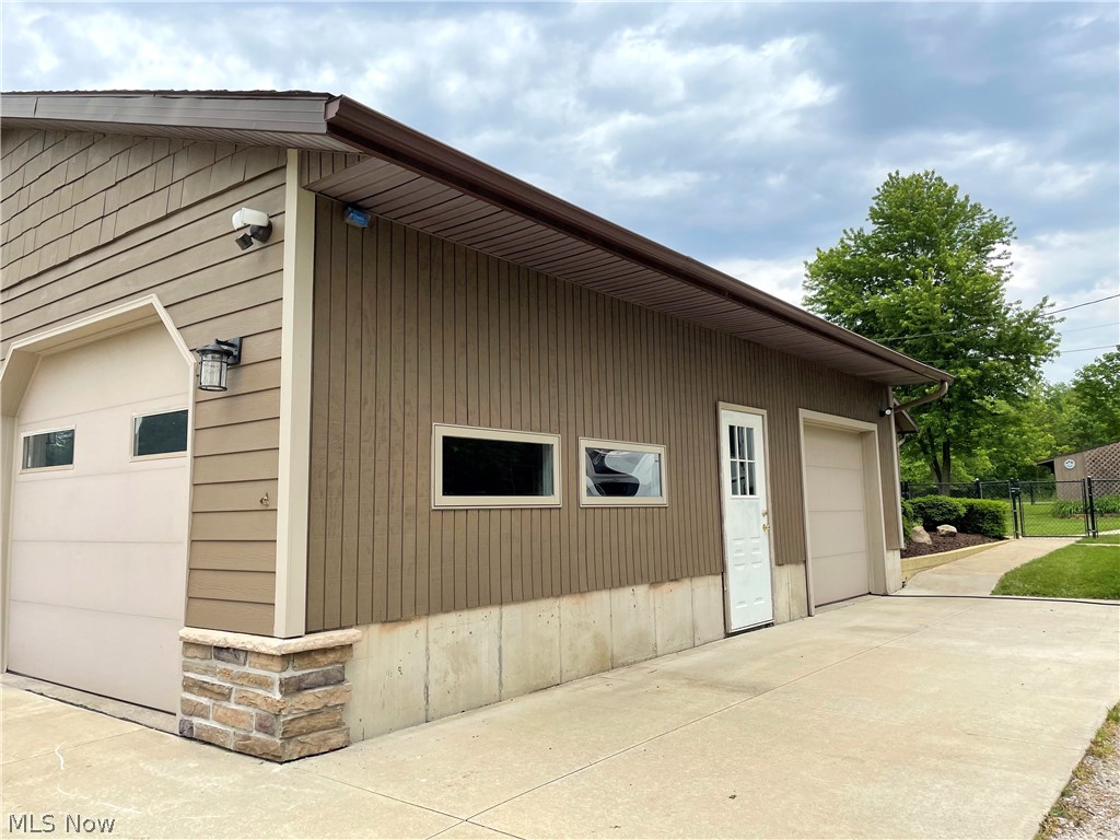 12709 Ravenna Road Chardon, OH 44024 - Photo 26 of 35 Garage with 3rd door and RV parking area.