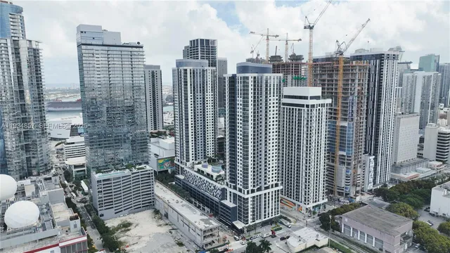 a view of city with tall buildings