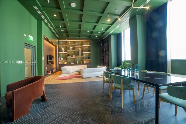 a outdoor dining space with furniture and window