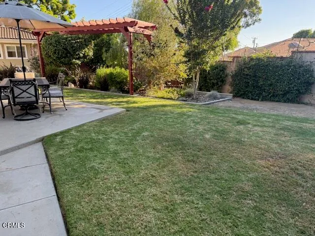 a kitchen with a stove a sink and a microwave