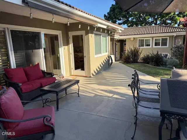 a kitchen with granite countertop a stove and a microwave