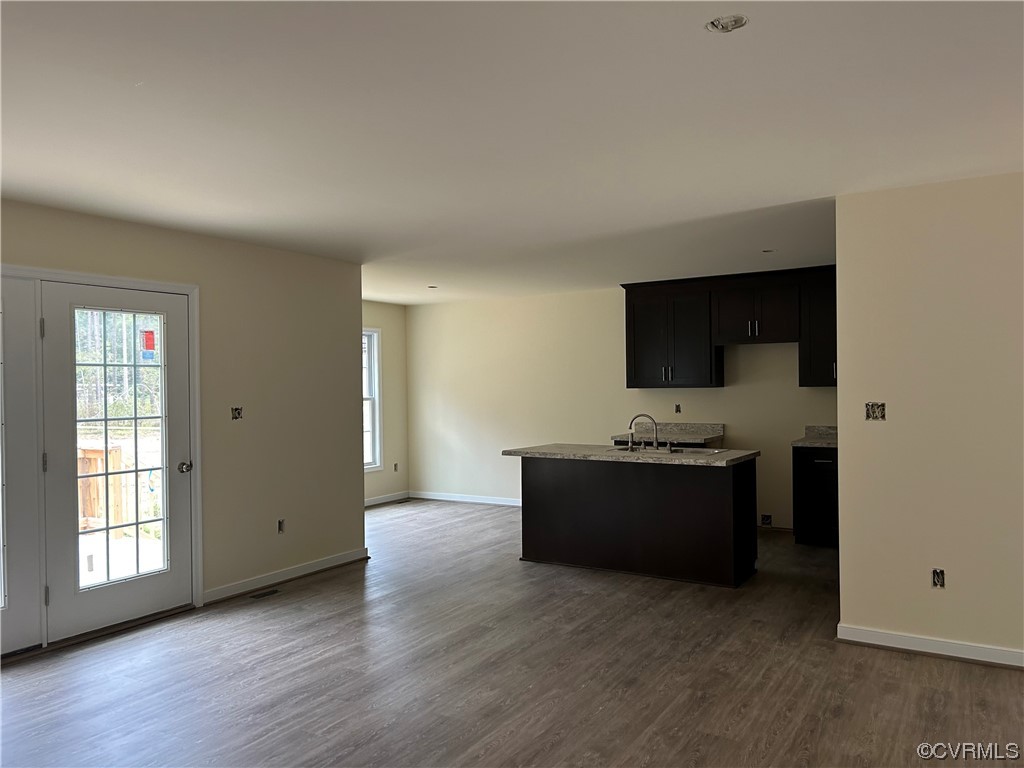 9042 Railroad Bed Road Carson, VA 23830 - Photo 4 of 21 a view of a kitchen with wooden floor and electronic appliances