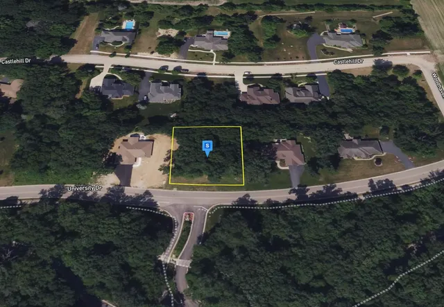 an aerial view of house with outdoor space