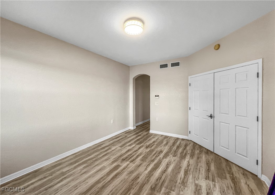 16285 Coco Hammock Way, Unit 101 Fort Myers, FL 33908 - Photo 23 of 50 a view of an empty room