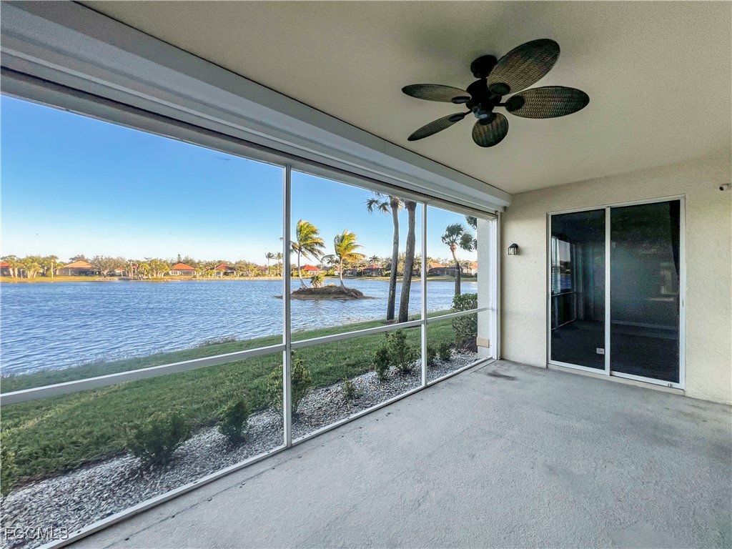 16285 Coco Hammock Way, Unit 101 Fort Myers, FL 33908 - Photo 34 of 50 a view of an empty room and kitchen
