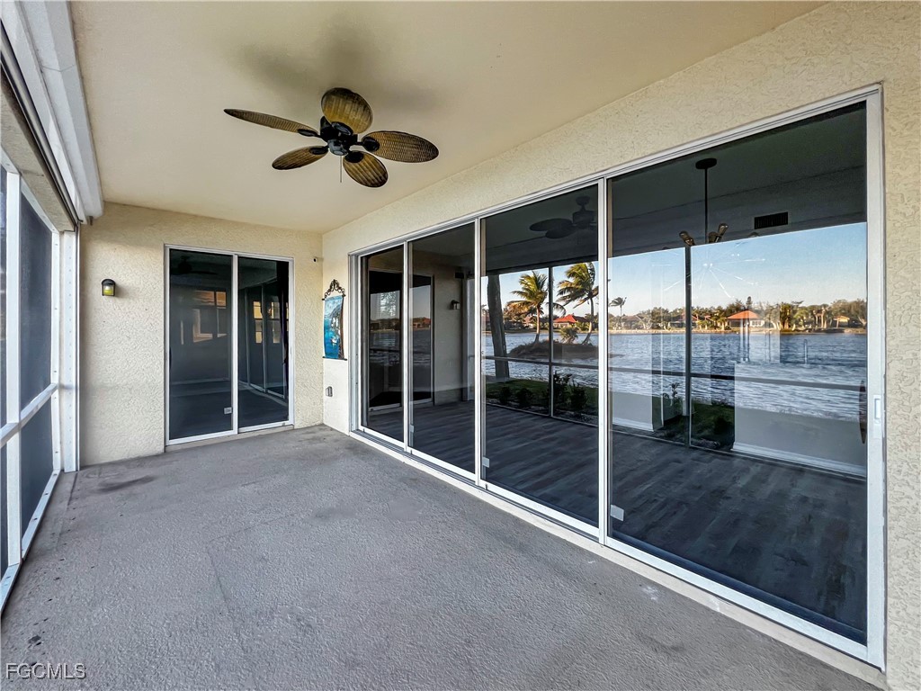 16285 Coco Hammock Way, Unit 101 Fort Myers, FL 33908 - Photo 35 of 50 a view of a livingroom with a ceiling fan and window