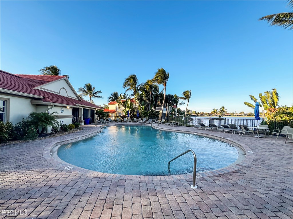 16285 Coco Hammock Way, Unit 101 Fort Myers, FL 33908 - Photo 47 of 50 a view of a house with swimming pool