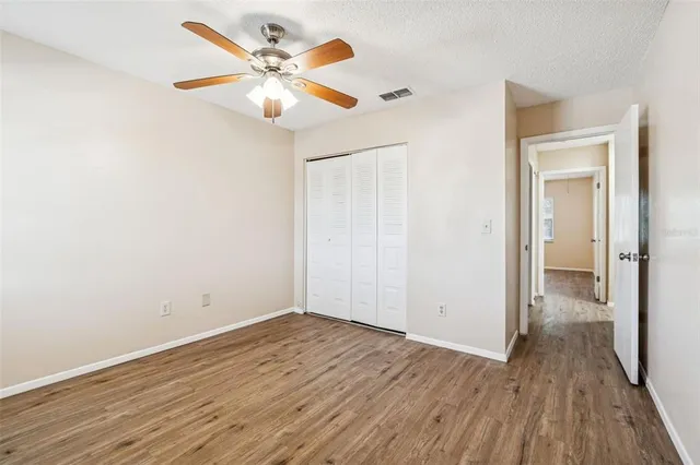 a balcony with table and chairs