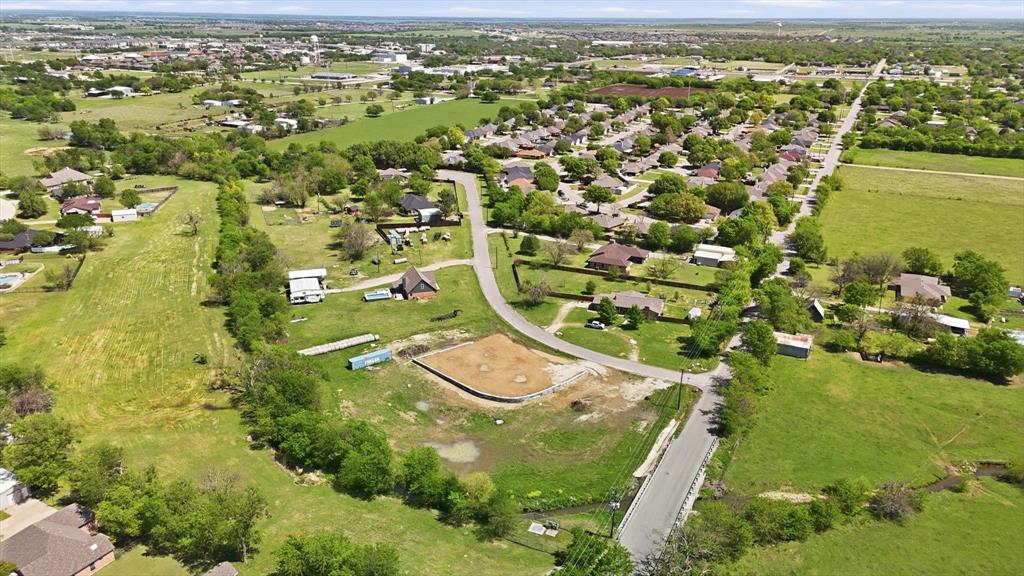 501 Rising Star Lane Sanger, TX 76266 - Photo 11 of 17 an aerial view of residential houses with outdoor space