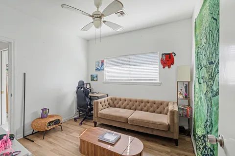a living room with furniture and a window
