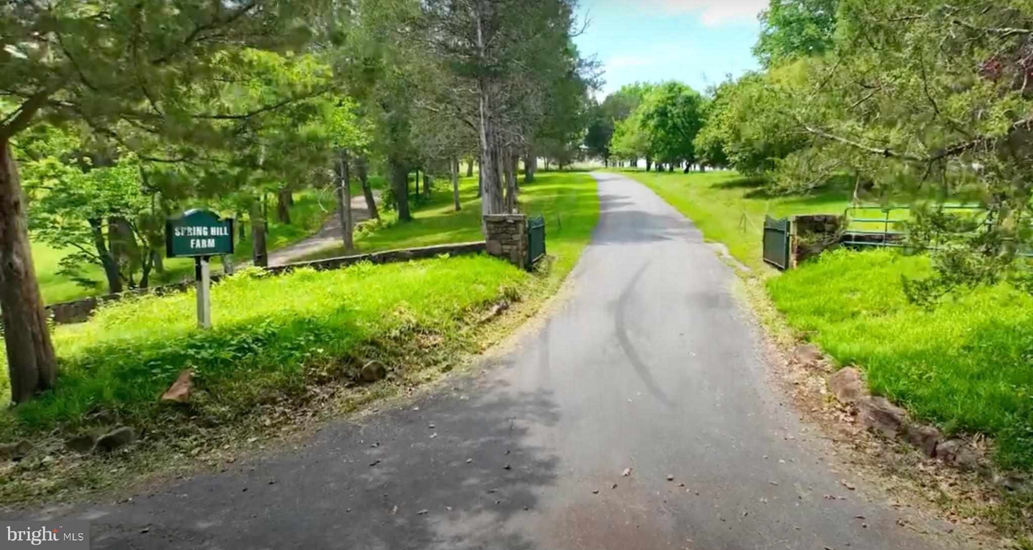 8792 Rogues Road Warrenton, VA 20187 - Photo 2 of 7 a view of a pathway with a park