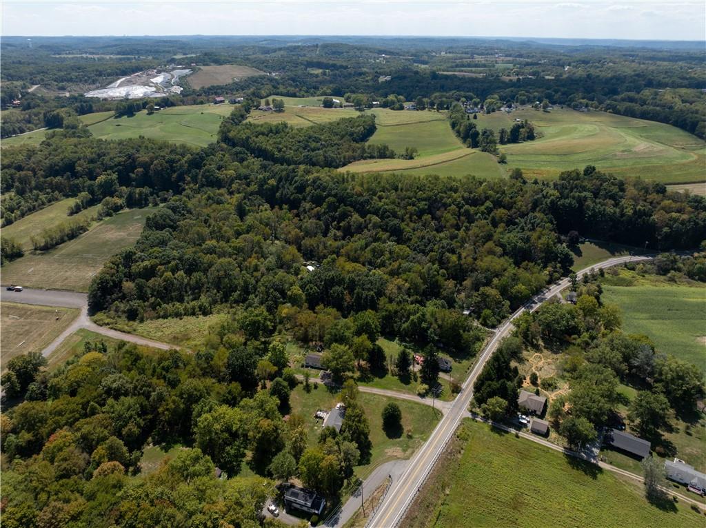 1409 Highway 989 Rochester, PA 15074 - Photo 12 of 17 a view of a lake with a yard and mountain view