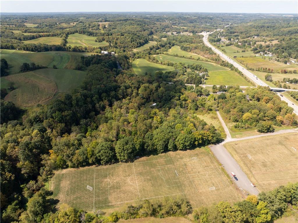 1409 Highway 989 Rochester, PA 15074 - Photo 9 of 17 an aerial view of residential houses with outdoor space