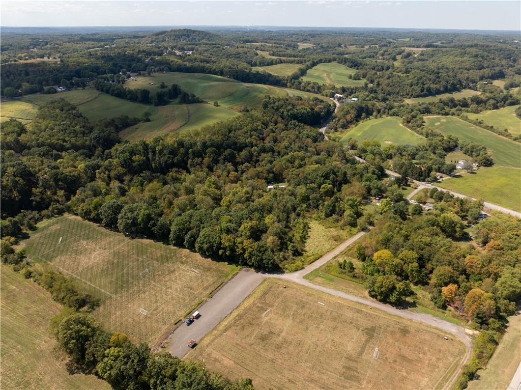 1409 Highway 989 Rochester, PA 15074 - Photo 10 of 17 a view of a lake with a mountain in the background