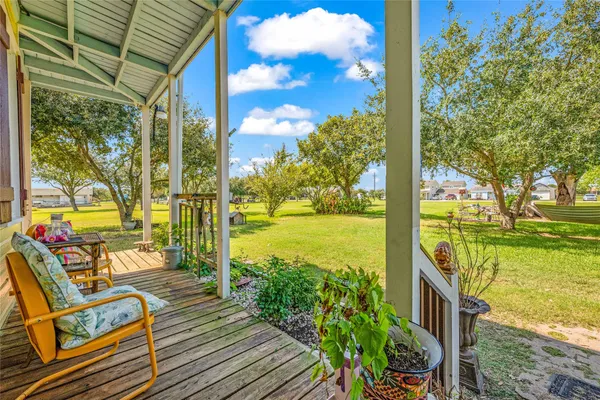 a view of a balcony with lake view and a ocean view