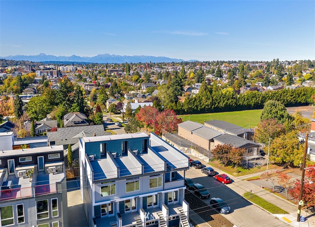 5517 4th Avenue Northwest Seattle, WA 98107 - Photo 17 of 18 a view of a city with tall buildings